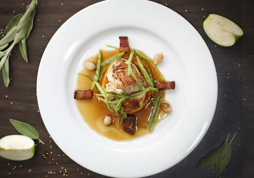 Chicken breast with sage and butternut squash cake, mange tout, balsamic onions, pancetta.