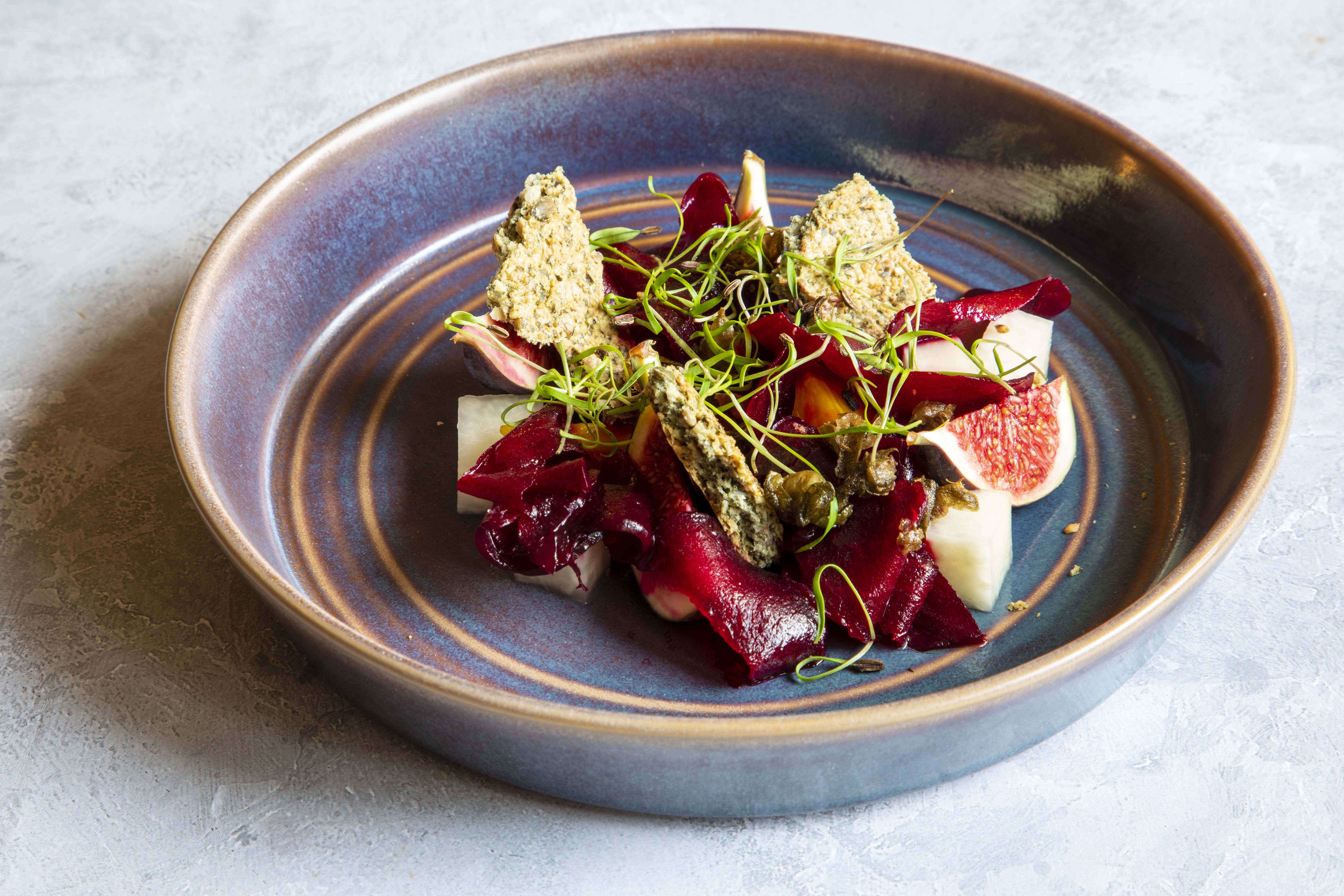 Beetroot with citrus, fig, kohlrabi and seed cracker.