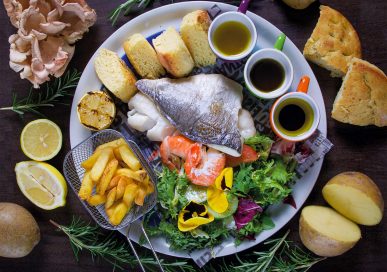 Seafood mixed grill with loin of cod, jumbo prawns and sea bream served with warm focaccia and hand-cut chips £23.95.