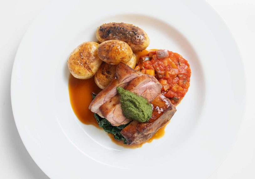 Rump of lamb with Bustard Inn herb garden gremolata, ratatouille, roasted new potatoes and buttered spinach, £34.