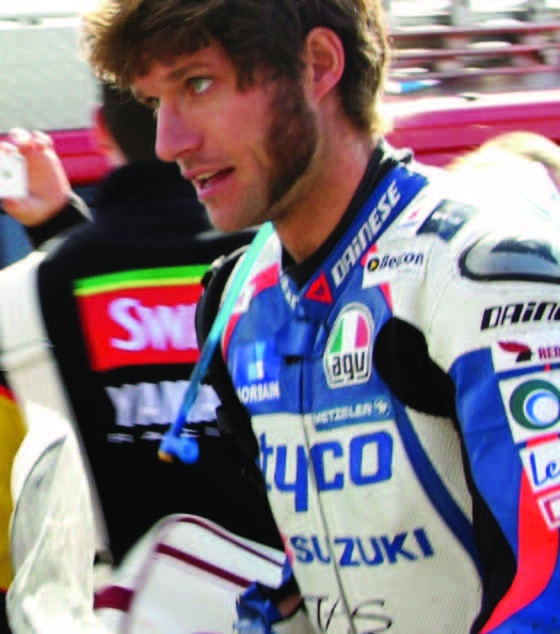 Colour photograph of Grimsby-born motorcycle racer Guy Martin in racing leathers.