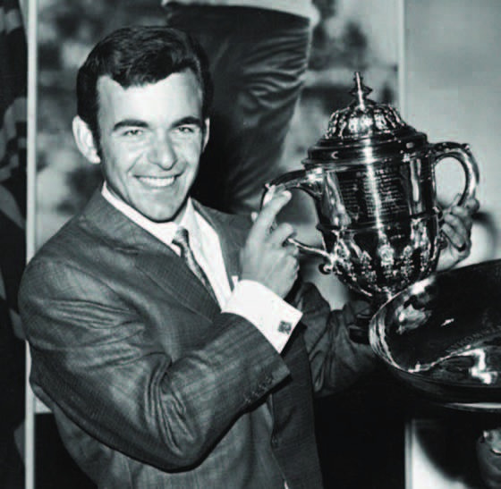Black-and-white photograph of Lincolnshire golfer Tony Jacklin holding a trophy.