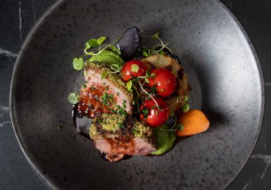 Herb crusted lamb rump with dauphinoise potato, heritage rainbow carrot, and lamb jus, £28.