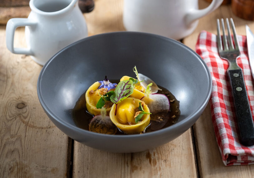 Mushroom consomme and chicken tortellino at The Olive Branch, Clipsham.