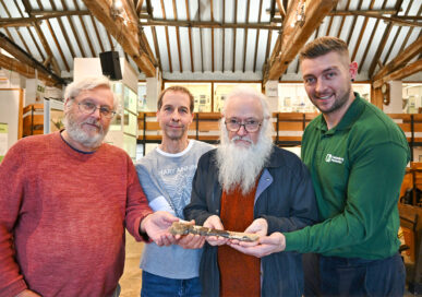 Presentation of a Pterosaur Olna bone (largest from the Jurrasic period) from Heidelberg Materials to Rutland Museum at Oakham. Pictured L to R are , Prof David Martill, Darren Withers from Pboro Geological and Palaeontological Group, Richard Forrest (PGPG) and Richard Gray, Engineering Manager from Heidelberg.