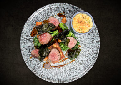 Loin of Grimsthorpe venison, potatoes dauphinois, seasonal vegetables, port & blackberry sauce at The Six Bells.