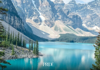 Turquoise mountain lake surrounded by peaks in the Canadian Rockies