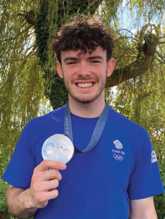 Stamford-born Olympic cyclist Ed Lowe with his silver medal