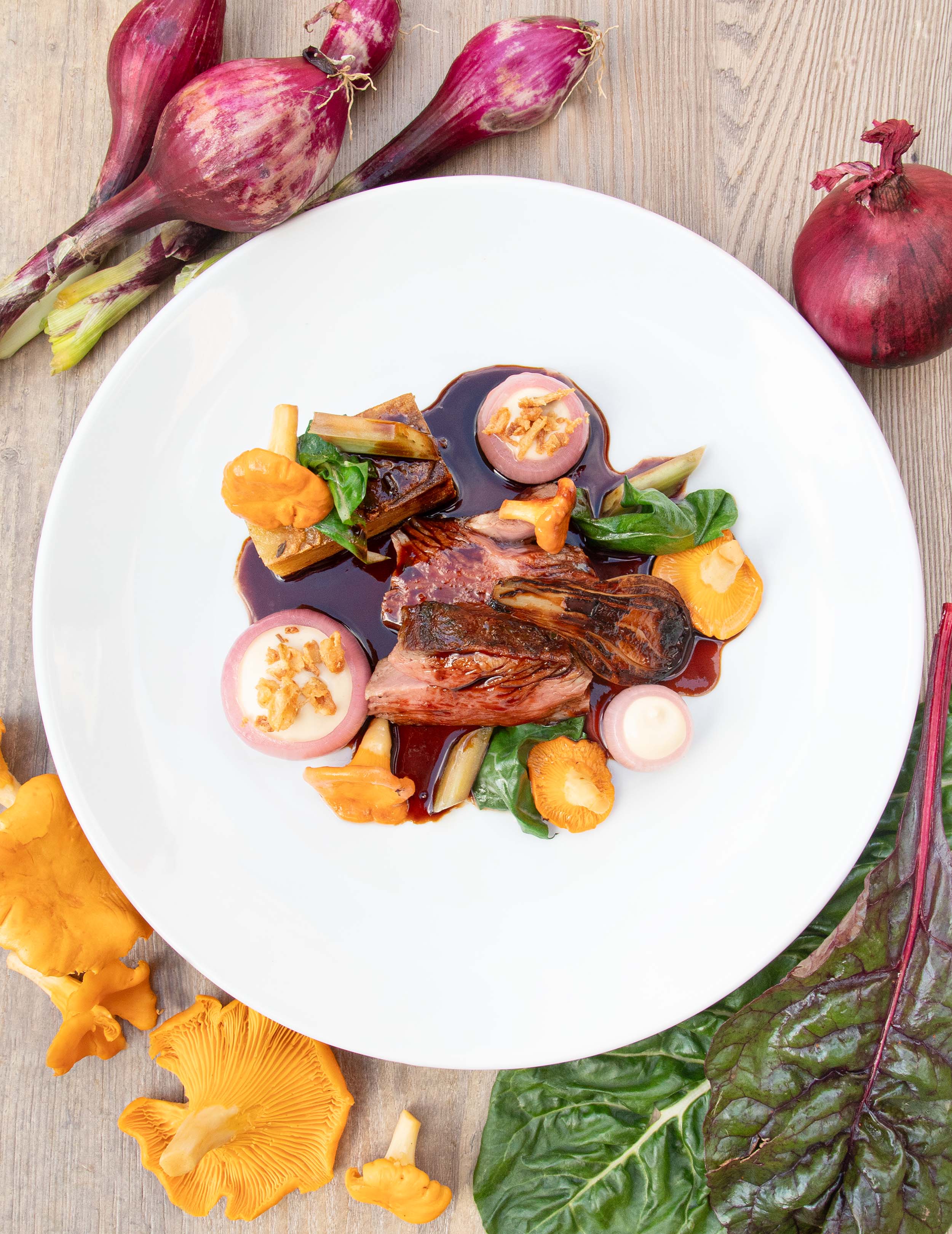 Launde Farm lamb with variations of onion, Swiss chard and boulangére potatoes.