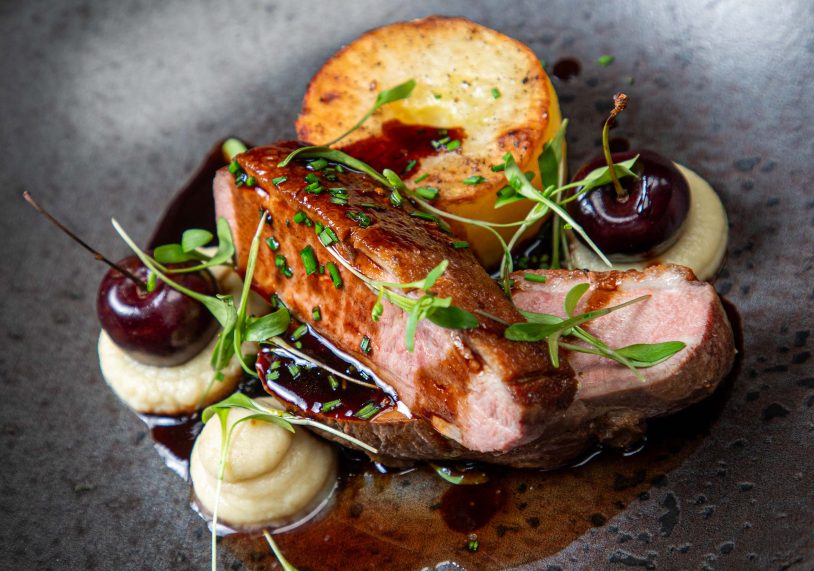 Duck breast with fondant potato, slow-cooked duck bon-bon, celeriac & cherry, £28.