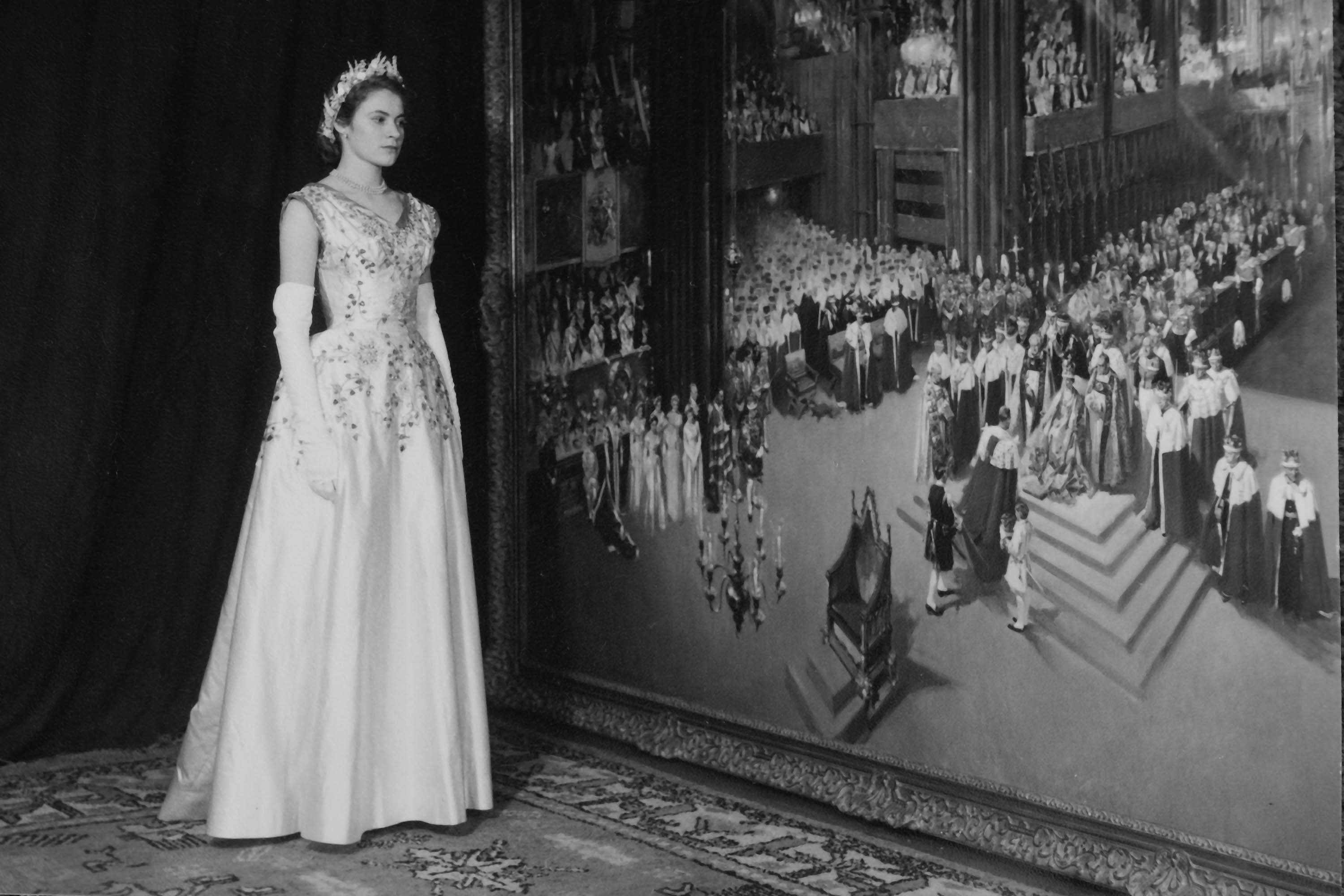 Lady Jane Heathcote Drummond in front of the Cuneo depiction of the coronation.