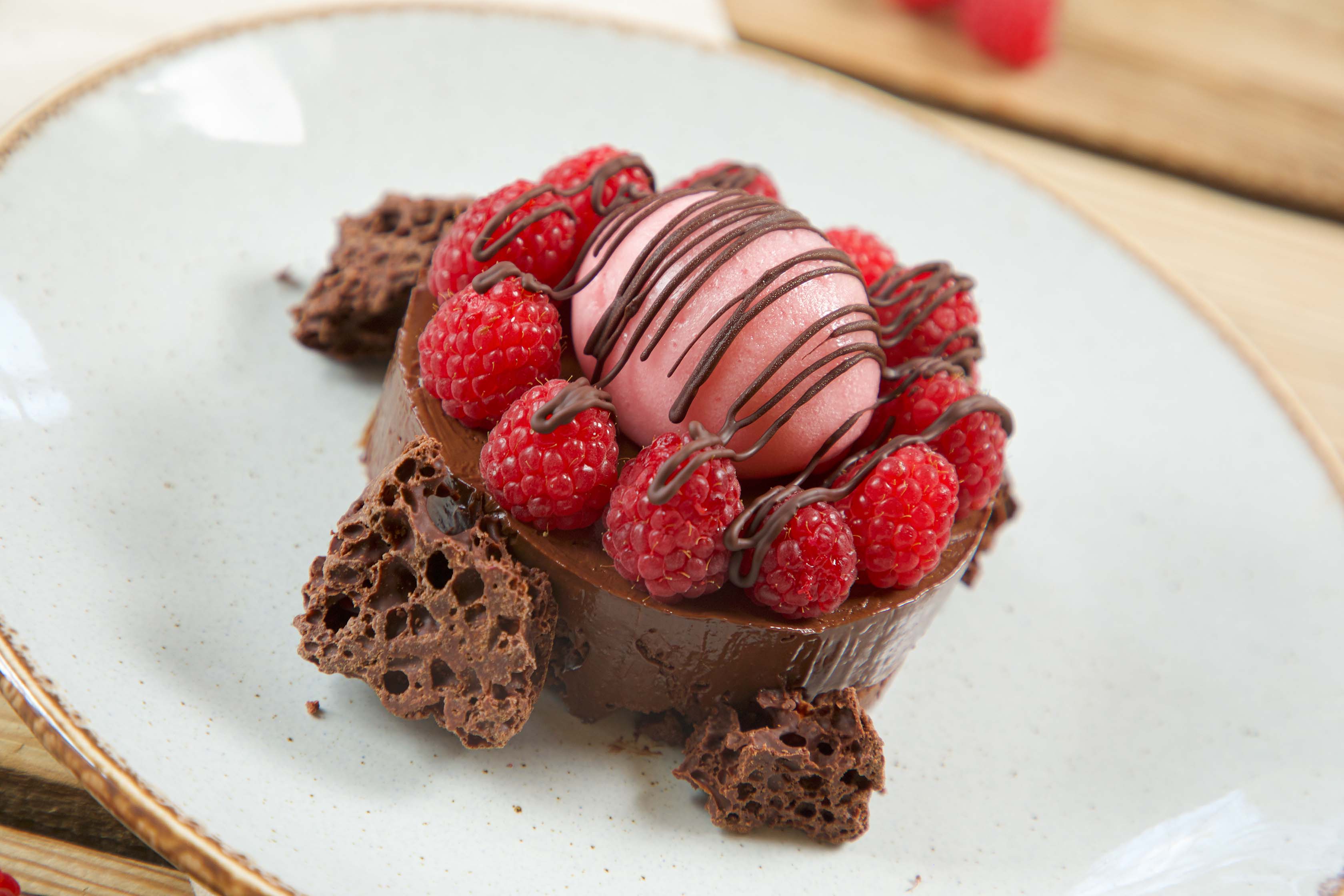 Dark chocolate mousse with raspberries and raspberry sorbet £8.50.