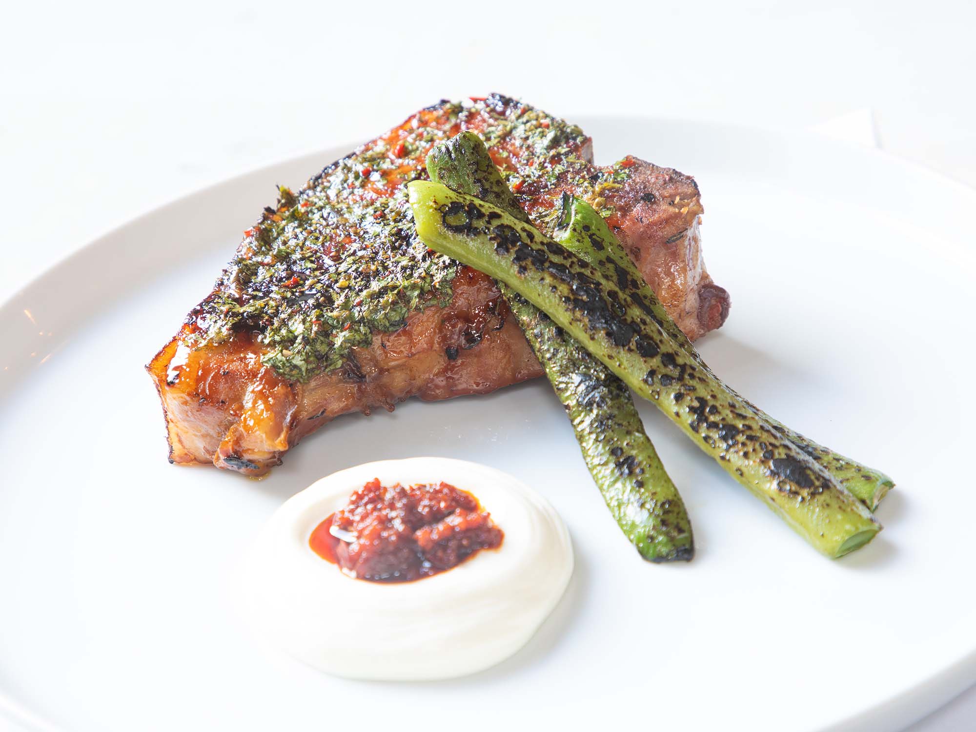 Pork T-bone, chimmichurri, ‘nduja, cream cheese, BBQ runner beans, £24.