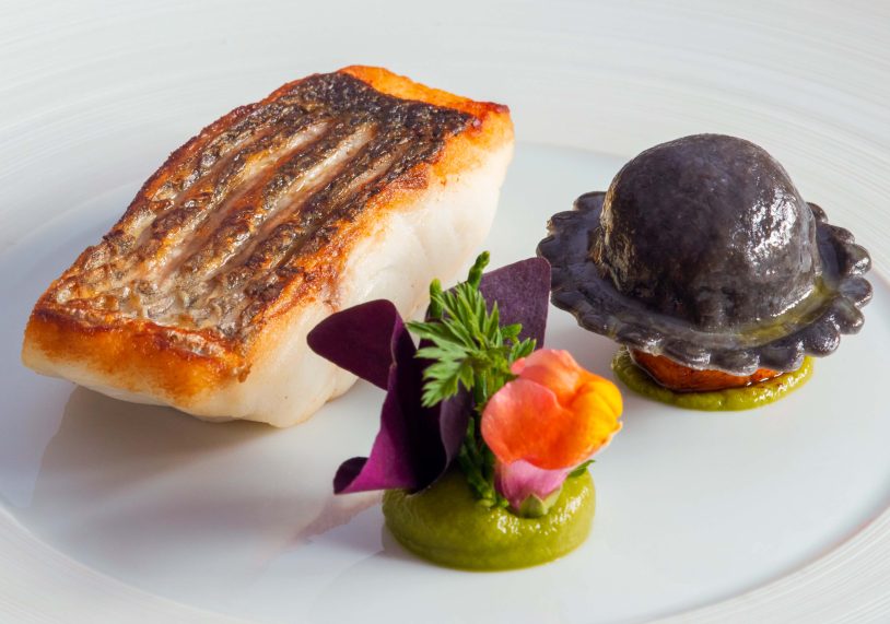 Bass with squid ink crab tortellini.